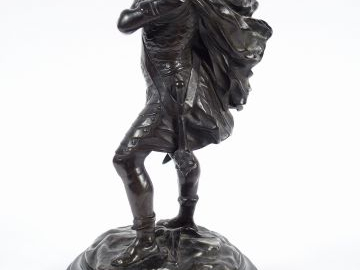 E. DROUOT 'Gaulois'. Sculpture en bronze à patine brune. Sur un socle 