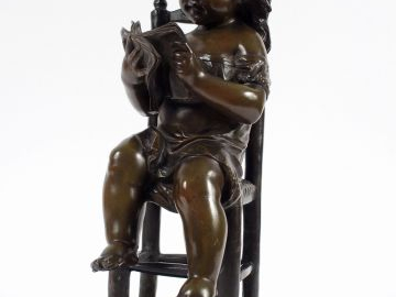 LECORNEY. 'Fillette lisant'. Sculpture en bronze à patine verte, signé
