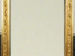 Glace de cheminée Napoléon III de style Lousi XV en bois et stuc doré 