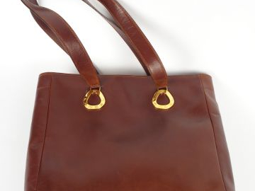 LANCEL. Sac en cuir lisse marron