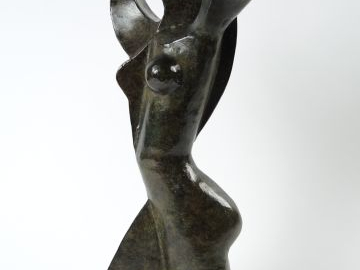 J. C DELANIAU.'Femme'. Sculpture en bronze à patine brune.