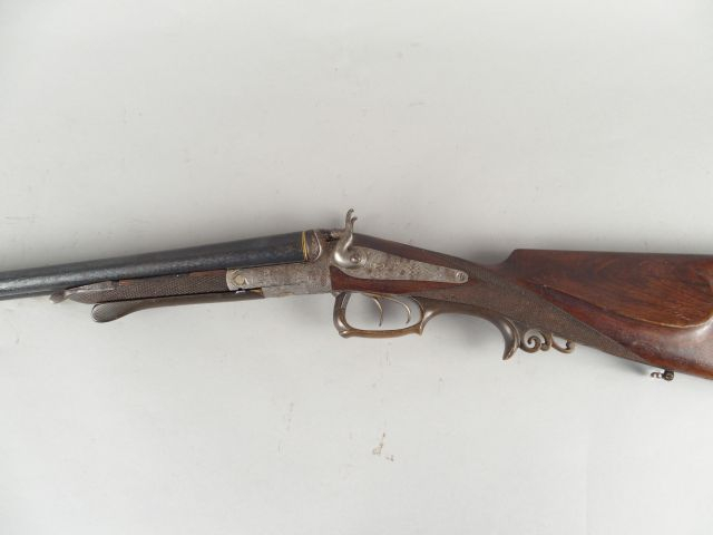 175- Intéressant fusil de chasse à percussion centrale et à chiens cal