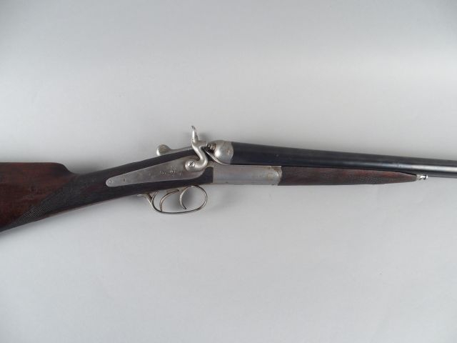 194- Fusil à chiens extérieurs calibre 16. Crosse anglaise canons légè