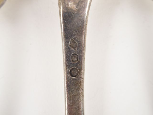 12 grands cuillères en argent, poinçon dépareillés (au coq et Minerve)