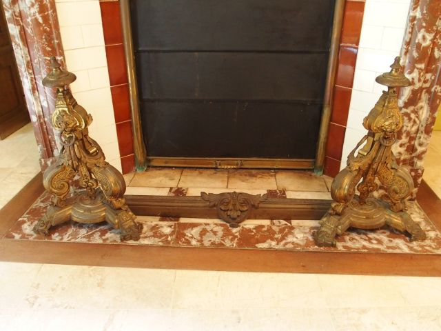 Barre de foyer Napoléon III de style Louis XIV en bronze, à décor de m