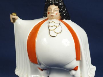 ROBJ. Rare veilleuse en porcelaine polychrome "Raimu dans le bourgeois