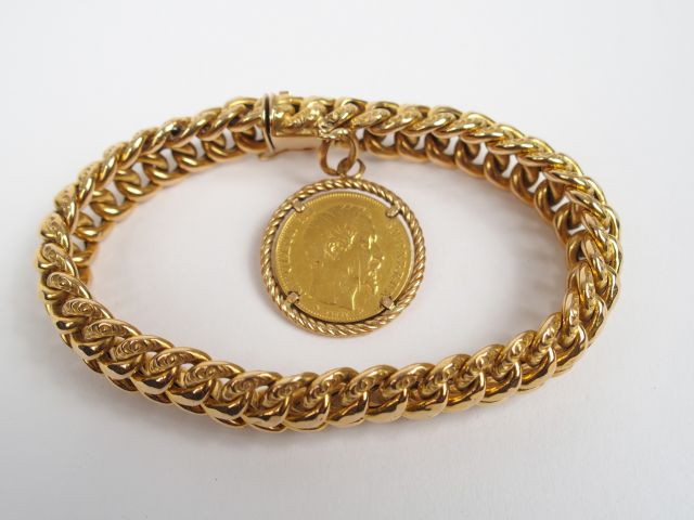 Bracelet maille américaine en or jaune et pièce de 20 Francs or Napolé