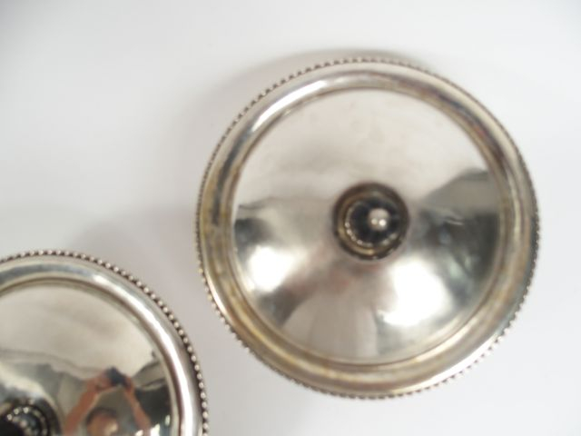 GEORG JENSEN. Paire de légumiers en argent, prise des couvercles en éb