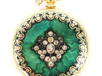 Montre de col en or jaune, émails et éclats de diamants (manques et sa