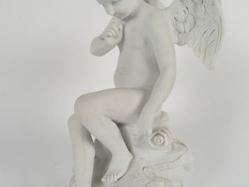 Sculpture en biscuit d'après FALCONET "Amour". H. : 23 cm