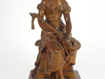 Hippolyte MOREAU. "La joueuse de luth". Sculpture en régule à patine m