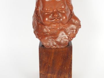 Amédéo GENNARELLI. Tête d'enfant en terre cuite, socle en bois. 20,5 x