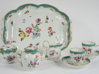 Vente aux enchères Tête-à-tête début XIXème en porcelaine de Saxe, à décor de fleurs poly