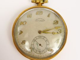Montre de gousset en or jaune de marque Eterna. Cadran guilloché, chif