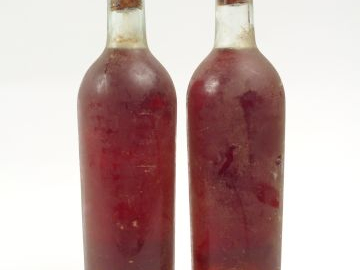 2 BOUTEILLES CHATEAU DE RAYNE PONTAC (RAYNE VIGNEAU) BOUCHONS ESTAMPES