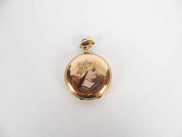 Montre savonnette en or jaune, décor d'émail "Profil de femme", 10 rub