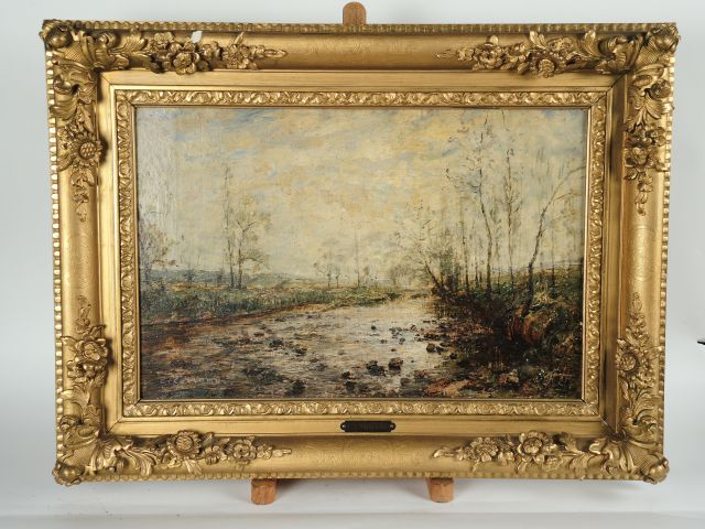 L. CARRAND 'Paysage lacustre'. Huile sur toile. Signée en bas à gauche