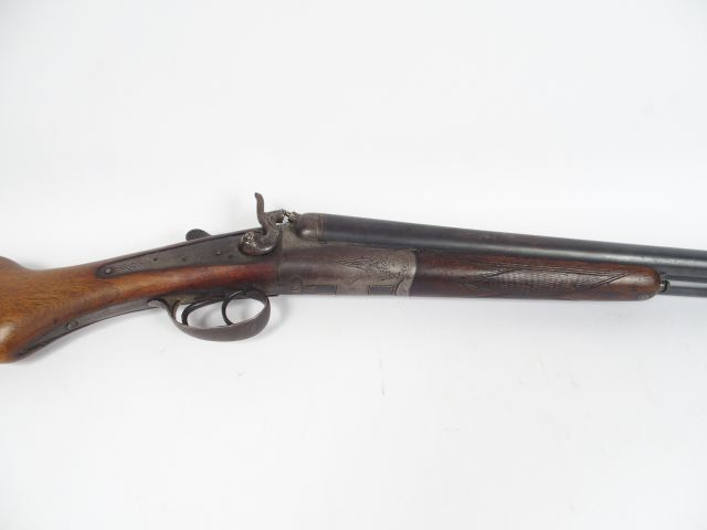 Fusil juxtaposé à chien et ouverture par clef signé « DIAMONT » sur la