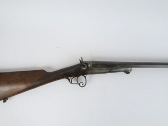 Vente aux enchères 238. Fusil de chasse juxtaposé à chien et percussion centrale calibre 