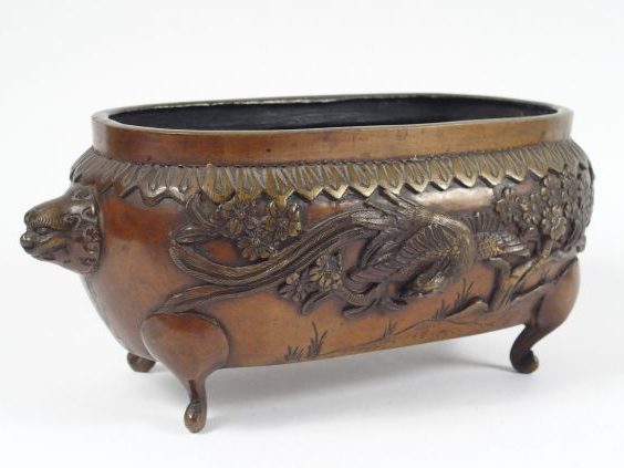 Jardinière en bronze à patine mordorée, orné d'un dragon et d'un Phoen