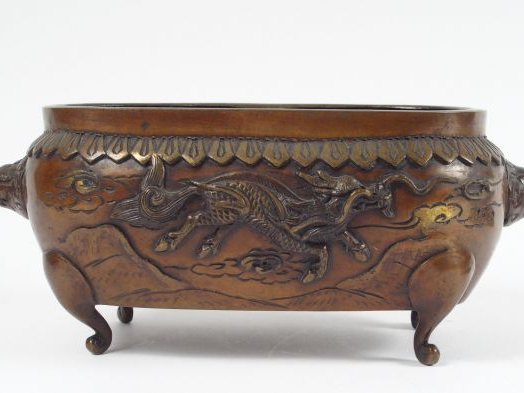 Jardinière en bronze à patine mordorée, orné d'un dragon et d'un Phoen