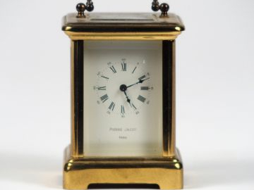 Pendulette de voyage. H. 8 cm