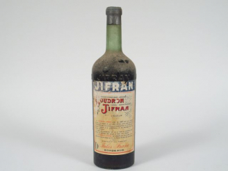 Vente aux enchères 1 TRES VIEILLE BOUTEILLE GOUDRON JIFFRAN
