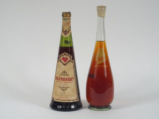 Vente aux enchères 2 BOUTEILLES : 1 FRAMBERRY DOLFI CAPS AB - 1 THALROFE KRESSMAN SELECTI