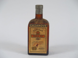Vente aux enchères 1 BOUTEILLE CURACAO TRIPLE SEC CAZANOVE