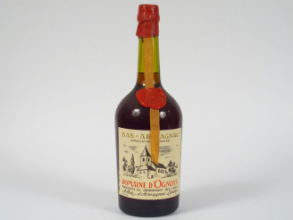 Vente aux enchères 1 POT (1,5 L) BAS ARMAGNAC DOMAINE D'OGNOAS 46% - 1974 - MISE : 04.199