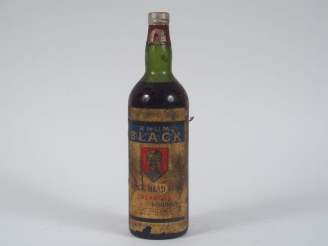 Vente aux enchères 1 BOUTEILLE (1 L) RHUM BLACK HEAD CAZANOVE - EA
