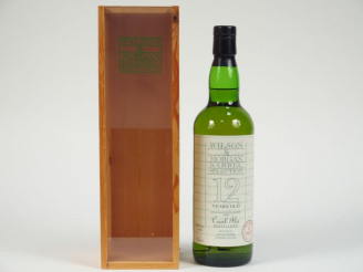Vente aux enchères 1 BOUTEILLE CAOL ILA Mac Kullick's 		70cl 	43	% - Millésime : 10.1989	