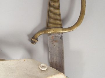 Sabre briquet modèle AN IX, fusée en bronze coulé à 36 torons, quillon
