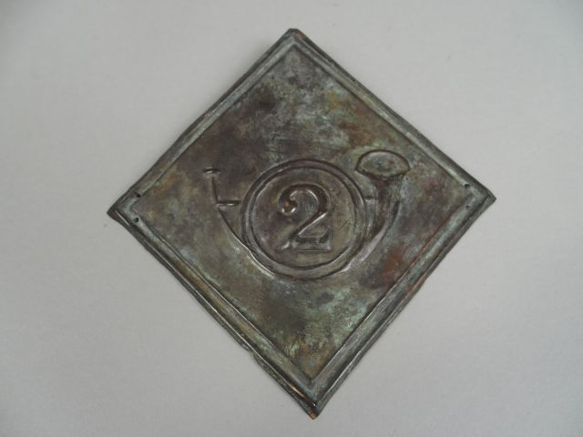 Réplique très ancienne d’une plaque de shako losangique emboutie dans 