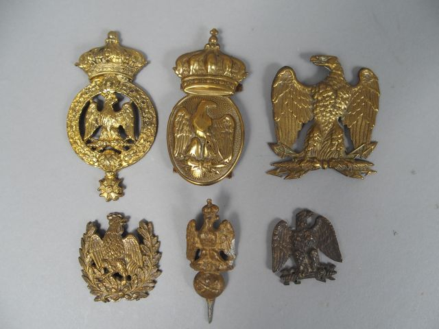 Lot de cuivreries au motif de l’aigle ou du coq. (1)