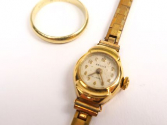 Vente aux enchères Montre de dame de marque Reglia, boitier en or, bracelet en métal. Poi