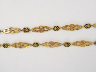 Vente aux enchères Chaine Napoléon III, or et émail. 27 g.
