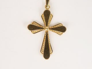 Croix en or. 2 g
