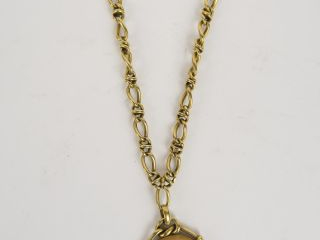 Vente aux enchères Collier en or avec une médaille 'profil de Minerve'. 40 g