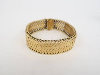Vente aux enchères Bracelet en or, maille souple tressée. 54 g