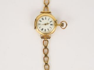 Vente aux enchères Montre de col en or, bracelet en métal doré