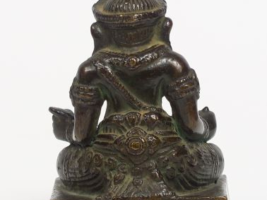 Statuette en bronze à patine brune représentant Ganesh assis (légère o