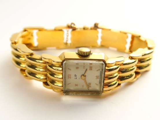 LIP. Montre bracelet, l'ensemble en or. Poids tel : 50,6 g