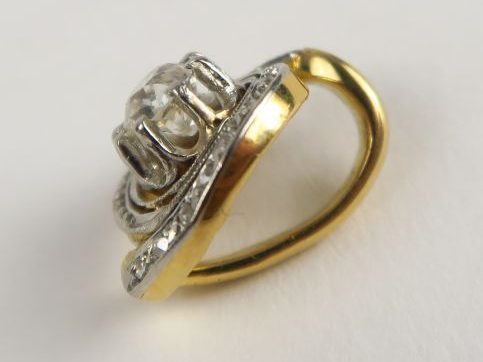 Pendentif 'tourbillon' orné d'un diamant taille ancienne de 0,30 carat