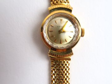 ZENITH. Montre de dame, cadran et bracelet en or. Poids tel : 24,8 g. 