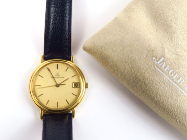 JAEGER LECOULTRE. Montre, cadran en or, bracelet cuir. Poids tel : 32 