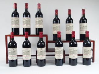 Vente aux enchères 12 BOUTEILLES DOMAINE DE CHEVALIER CC GRAVES - 1995 - 2 ELA - CBO