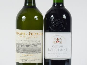 2 BOUTEILLES GCC GRAVES 2003 : 1 CHÂTEAU PAPE CLEMENT - 1 DOMAINE DE C