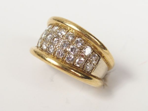 Bague jonc en or jaune et or blanc, pavage de 23 diamants de 0,05ct en