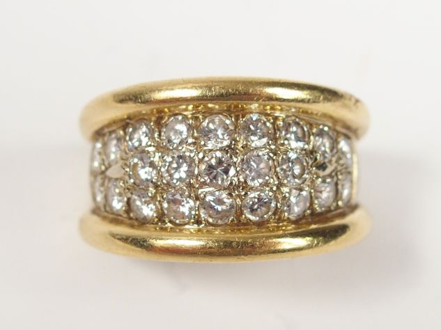 Bague jonc en or jaune et or blanc, pavage de 23 diamants de 0,05ct en